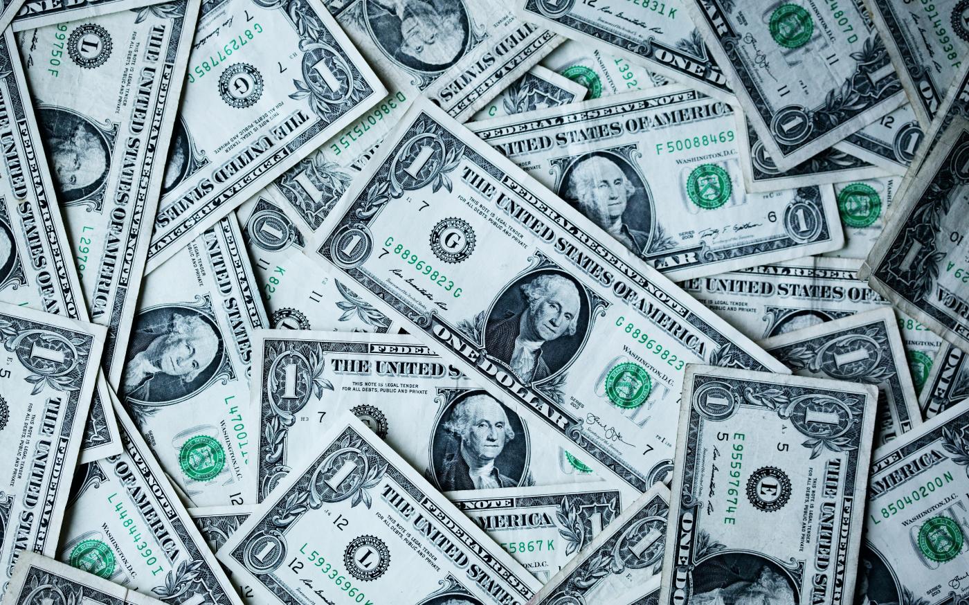 1 U.S.A dollar banknotes by Alexander Grey courtesy of Unsplash.