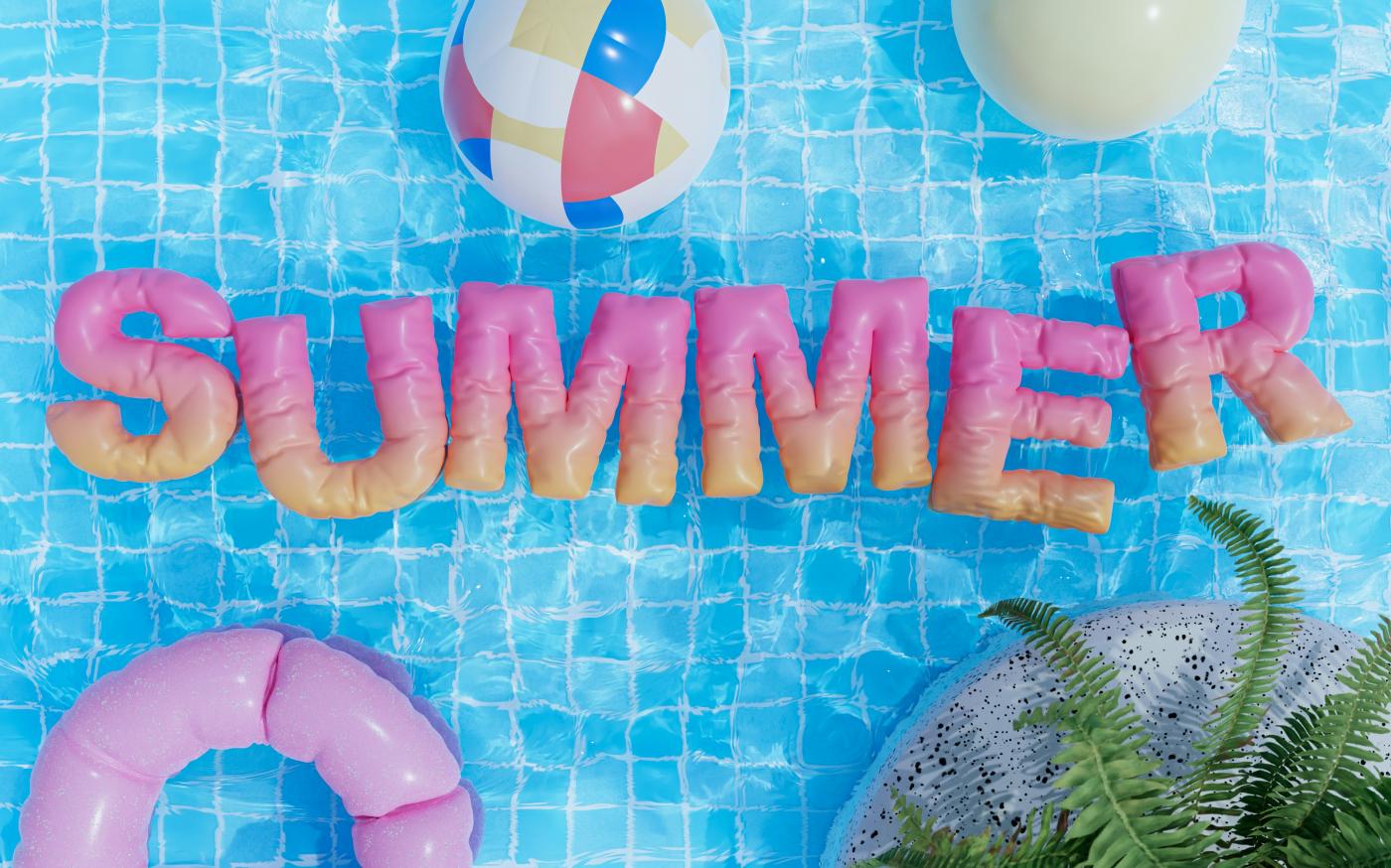 a pool with a pool float, inflatable toys, and the word summer by Warren Umoh courtesy of Unsplash.