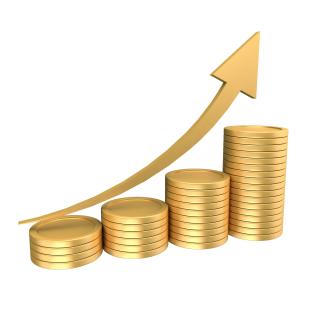 Stacks of gold coins with an upward trending arrow by Eyestetix Studio courtesy of Unsplash.