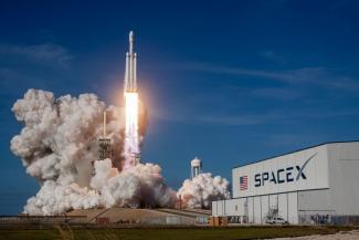 rocket ship launching during daytime by SpaceX courtesy of Unsplash.
