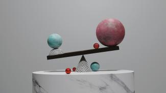 a sculpture with balls on top of it by Myles Bloomfield courtesy of Unsplash.